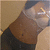 A person in a white top and dark pants with visible belly button, positioned against light background.