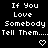 Black background with white pixelated text reading "If You Love Somebody Tell Them..." and two heart symbols below the text.
