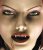 A pixelated close-up of a person's face showing eyes, nose, mouth, and dark hair against light skin tones.