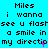 Pixelated text repeats across a cyan background with pink accents, displaying 'Miles i wanna see u flash a smile in my direction' three times per