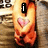 A person in a gray jacket holds hands with another person, displaying text and heart symbols that change across frames.