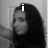 Black-and-white image of a person with long dark hair in four showing text changes above the head