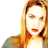 Static 48x48 pixel icon showing a cropped close-up of a person with long light brown hair and fair skin, wearing red lipstick and a green garment against a white background.