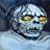 A pixelated zombie face on the left and green text 'Original Icons .com' on a dark background, displayed as a contact sheet with two frames.