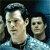 A man in a blue patterned shirt appears in with shifting background figures and varying facial expressions