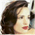 A pixelated image of a woman with dark brown hair and red lips on the left, next to green text reading 'Original Icons .com' on a solid dark green background.