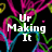 Pixelated text overlays on a black background with colorful abstract line patterns, featuring phrases like "Ur Making It" and "Harder Better Faster Stronger."