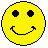 Yellow pixelated smiley face with black eyes and mouth on gray background, showing multiple mouth variations including closed, smiling, and red-lipped expressions.