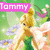 Pixelated image of a blonde fairy-like character with wings, green dress, and pink banner reading 'Tommy' against floral background.