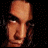 Pixelated image of a person's face with changing expressions and text reading 'I'd stalk' in orange, set against black background.