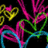 Pixelated neon-style hearts in yellow, pink, green, and cyan on black background with blue text reading "I luv Timmy" and "Me + Timmy = Love" on magenta