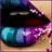 Pixelated icon of a dark, rounded object with teal and purple accents against a beige background.