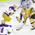 Pixelated static icon of multiple yellow hockey players in motion on a white background with blue and black accents.