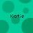 A static image with a teal background featuring multiple overlapping green circles and four instances of the text "Katie" in dark pixelated font.