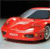 Red sports car with silver roof and dark windows, viewed from front-left angle on light gray background.