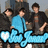 Pixelated image of four figures in a group pose, one wearing light blue shirt with dark tie, others in darker clothing against blurred background.