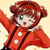 Pixelated cartoon character with red hair in twin buns, green eyes, and a red outfit with white dots, raising one arm against a light beige background.