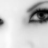 Animated contact sheet of a woman's eye with repeated "unwanted" text overlay across frames showing subtle motion blur and pixelation changes.
