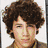 Four- shows a person with curly brown hair in different styles and colors, including grayscale and color versions, plus a monochrome emblem with 'JS' letters