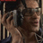 Pixelated image of a person holding a phone to their ear with green text reading 'When you leave my colors fade to gray' and 'numa numa iei Dan Balan'
