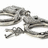 Pixelated grayscale image of a coiled cable on white background with red text "wanna" and "play?" on black