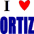 A split-screen image shows a pixelated 'I ❤️ ORTIZ' text on the left and a baseball player in uniform on the right.