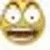 Animated cartoon face with large white eyes, brown pupils, and a wide open mouth showing teeth, rendered in yellow and green tones.