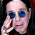 A 50x50 pixel animated contact sheet showing two frames of a buddy icon featuring Ozzy Osbourne on the left and green text "Original Icons .com" on the right against a dark background.