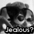 Black-and-white pixelated image of two figures in close proximity with text reading 'Jealous?' at the bottom.
