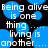 Pixelated text reads "Being alive is one thing... living is another...." over blue circular shapes on black background.