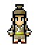 Pixelated character in traditional attire with brown hat, beige tunic, yellow belt, and red shoes stands against gray background.