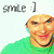 Pixelated image of a person in a green shirt with a smiley face text above, showing animation changes across frames.