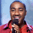 A 48x48 pixel contact sheet of an animated American Idol icon showing three distinct frames: a person singing into a microphone, the same person wearing a beanie, and the American Idol logo.