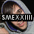 A person in a gray hoodie with blue inner lining appears across three showing different head angles and expressions, with text "S.MEXXXIII" overlaid on the top-left