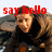 A person with long brown hair and dark clothing appears in three with red text overlays reading "say hello to my friend..." and "OPTIMUS PRIME"