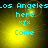 Pixelated cyan text on yellow gradient background with four identical showing 'Los Angeles', 'here', 'xix', and 'Come' in a