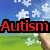 Pixelated image of a hand holding puzzle pieces against a blue sky and green field background, with text reading 'Autism' in red on the left side.