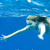 A pixelated figure in a blue aquatic background with a long white appendage extending from its body.