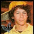 Pixelated image of a person in yellow clothing and hat with text overlays reading "NickJ Is Off The Chain... It's a Basic Fact of Life!" on white background.