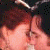 A contact sheet of two animated frames showing a kissing couple on the left and red text/logo with lips on the right.