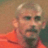 Static 48x48 pixel icon showing a person in an orange shirt with light-colored hair, partially visible background.