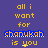 Pixelated text animation on purple background with yellow and blue lettering, displaying 'all i want for chonukoh is you' in varying states of clarity.