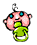 Pixelated pink creature with blue eyes and green ring-shaped mouth, static pose on gray background.