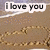 A pixelated image shows a white speech bubble with black text reading "i love you" over a brown textured background.