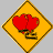 Animated sequence of yellow diamond-shaped icons with red hearts and black outlines, showing size variations across frames.