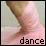 Pixelated image of a person's lower body in motion with the word 'dance' at bottom, set against soft pastel background.