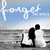 A static image shows two silhouetted figures on a beach under a blue sky with the word "forget" in white script above them.