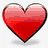 Red heart icon with gradient fill and black outline, overlaid text "Lexie" in green letters on blue background, beach scene backdrop with yellow "Love" text and pink hearts.
