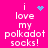 A bright pink background displays white pixelated text reading "i love my polkadot socks!" with four distinct blue pixel art symbols appearing in different positions across the animation.