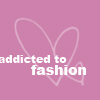 Pink background with white outline of a heart and the text 'addicted to fashion' in pixelated white font.